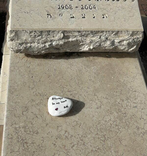 Placement of a custom stone on the grave
